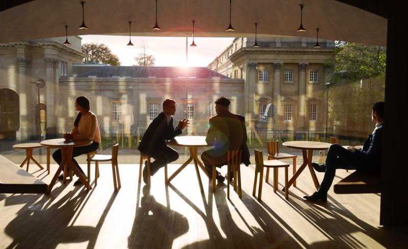 Financial professionals meeting at a cafe