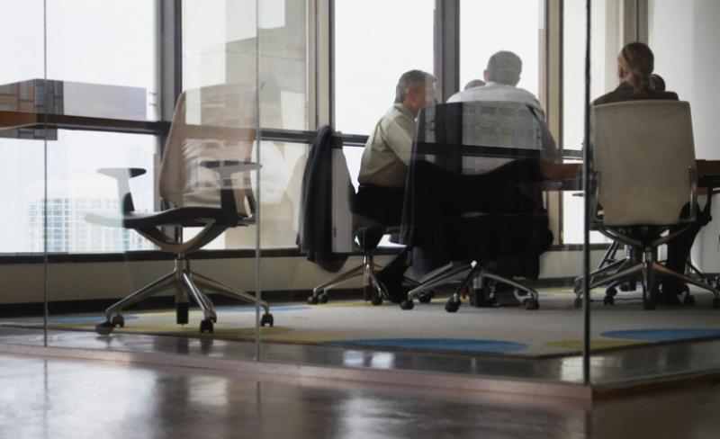 Financial professionals meeting in an office