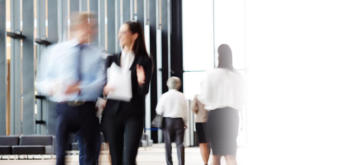 Investment professionals walking and talking Investment professionals walking and talking
