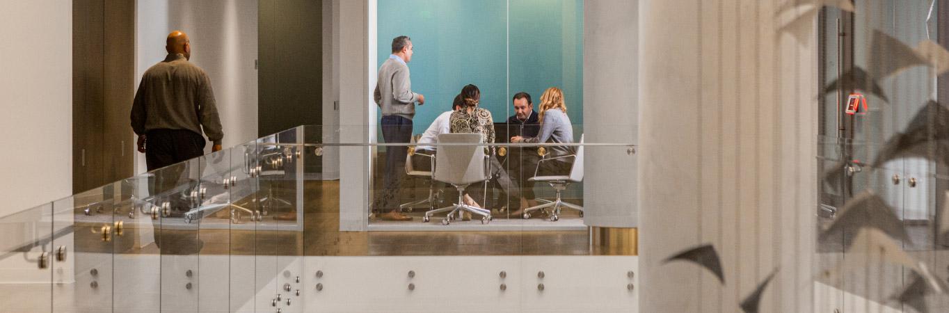 Group of financial professionals meeting in an office